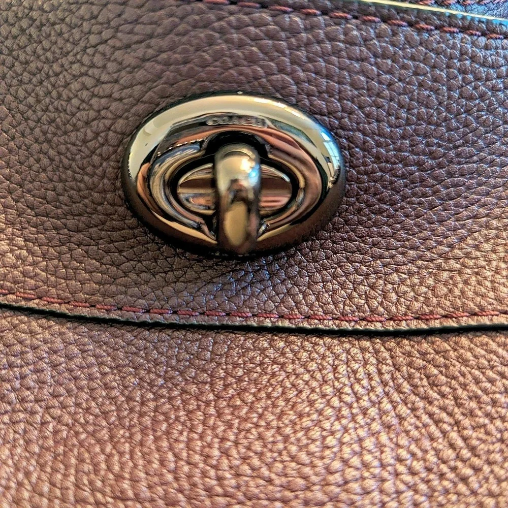 Coach Burgundy Pebbled Leather Edie Turnlock Bag